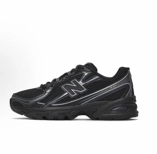 New Balance 740 sneakers in black with N logo and metallic accents