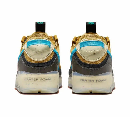 Nike Air Max 90 heel view with blue collar, green laces and Crater Foam branding