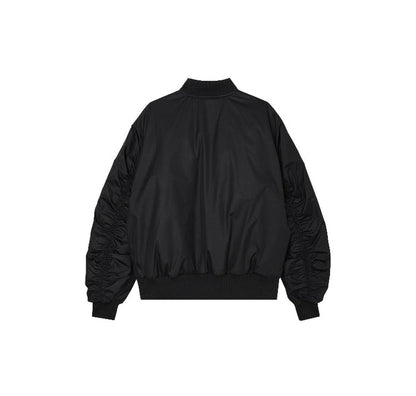 Black bomber jacket, back view with ribbed hem and cuffs, full-length sleeves