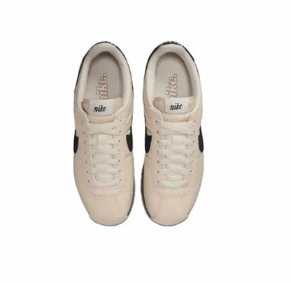 Nike Cortez sneakers, pair view: light beige uppers with white laces