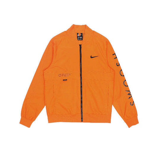 Orange Nike windbreaker jacket with full zip and black Swoosh on chest